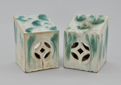 Appraisal: A Pair of Shiwan Ware Pillows The stoneware forms are