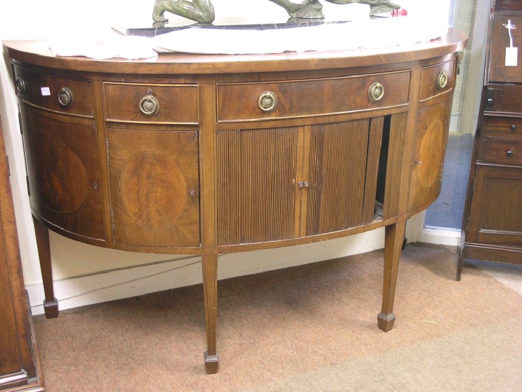 Appraisal: A Maple Co London early th century half-round mahogany sideboard