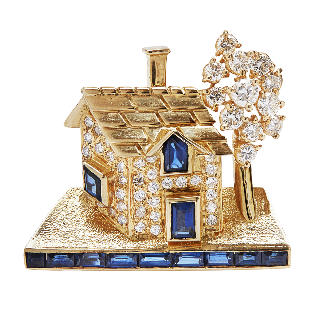 Appraisal: A sapphire and diamond set brooch modelled as a cottage