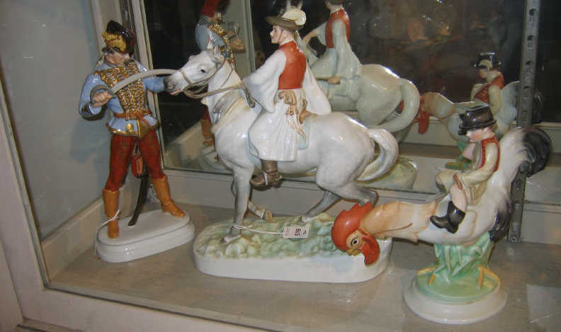 Appraisal: THREE HEREND PORCELAIN FIGURES One of a man on horseback