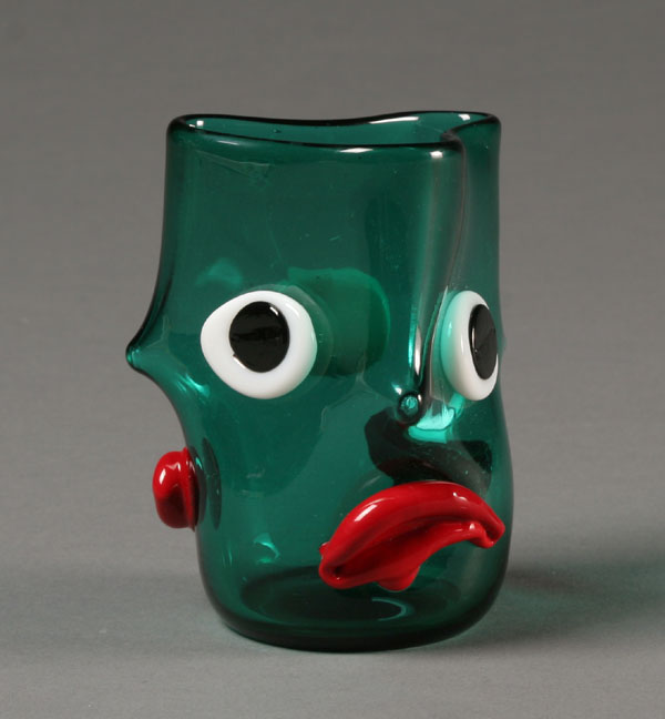 Appraisal: Art glass cup with three sided face decoration in the