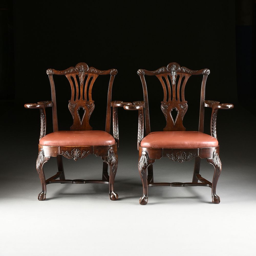 Appraisal: A PAIR OF GEORGE II STYLE CARVED MAHOGANY AND RED