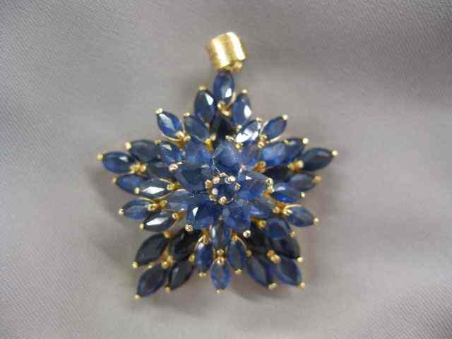 Appraisal: Sapphire Pendant marquise shape rich blue gems in k yellow