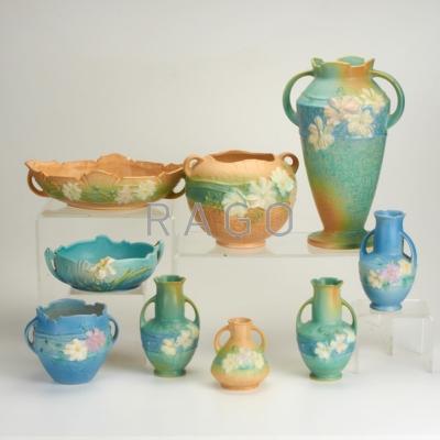 Appraisal: ROSEVILLE Cosmos nine pieces five vases two jardinieres and two