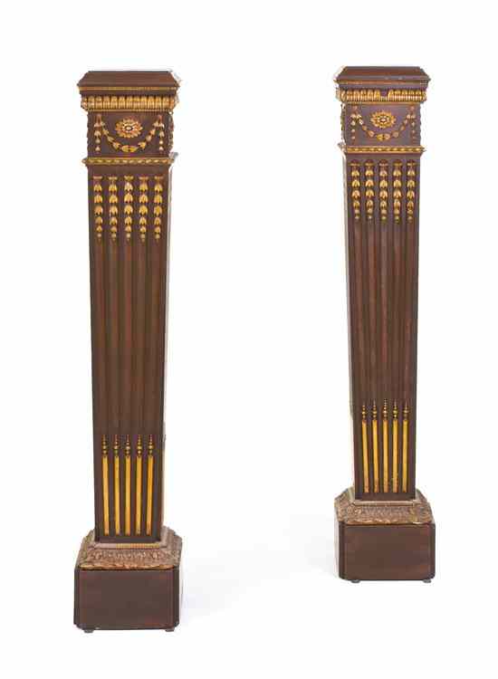 Appraisal: A Pair of Neoclassical Parcel Gilt Pedestals each having a