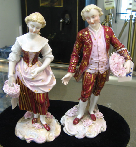 Appraisal: PAIR GERMAN PORCELAIN FIGURES in th century costumes Both standing