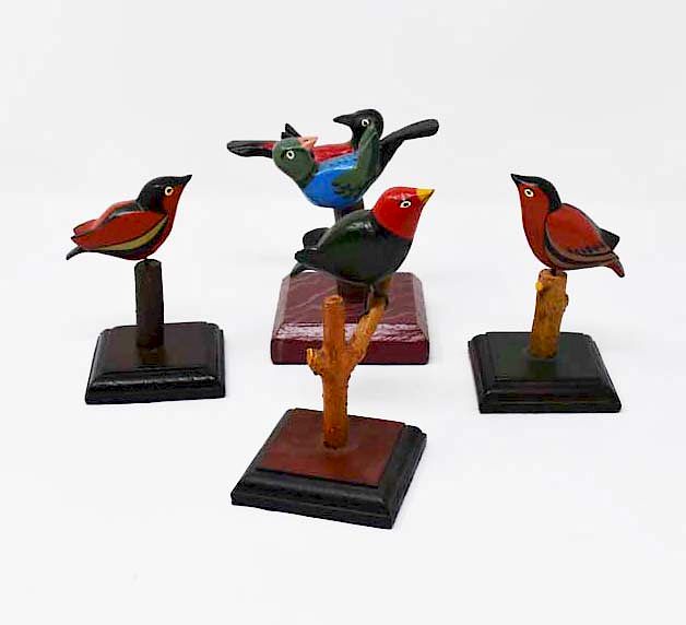 Appraisal: signed Tom King wooden birds signed Tom King wooden birds