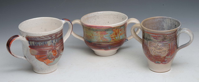 Appraisal: Kenneth Clark - Three two handled lustre goblets each with