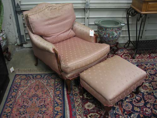 Appraisal: LOUIS XV STYLE ARMCHAIR WITH OTTOMAN American mid th century