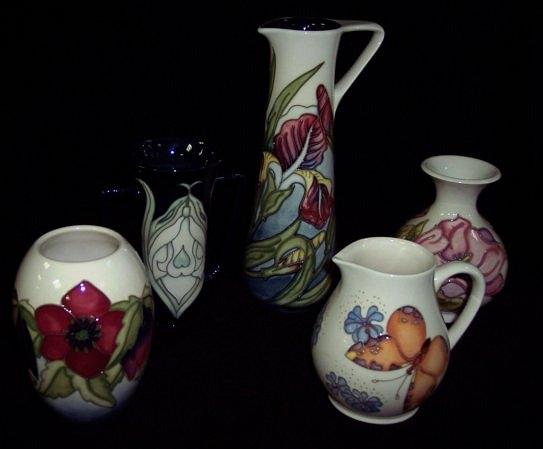 Appraisal: A Moorcroft 'Iris' jug of cream blue ground the base