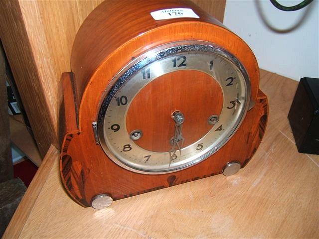 Appraisal: A walnut cased mantel clock high