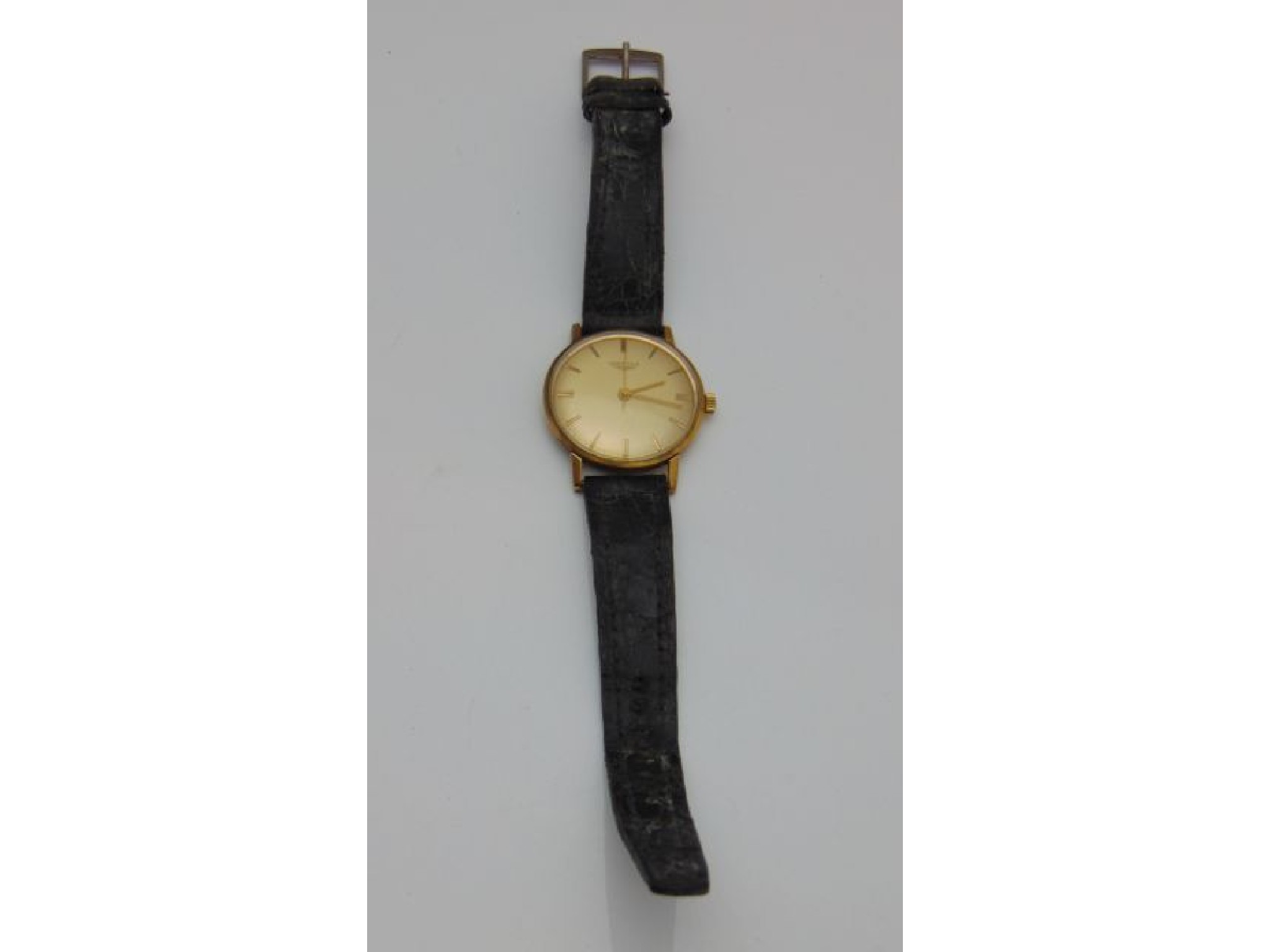 Appraisal: A gentleman's gold-plated wristwatch Longines the gilt dial with baton