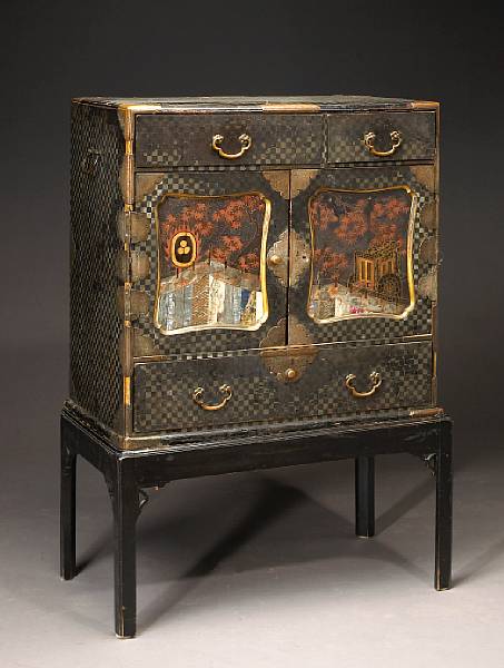 Appraisal: A lacquered wood two-door tansu on stand Meiji Period The