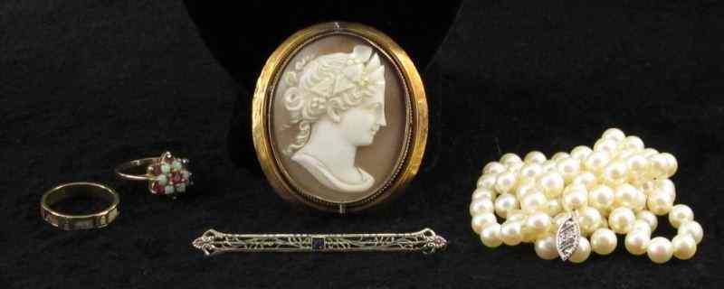 Appraisal: Vintage Jewelry Groupingto include a carved shell cameo depicting a