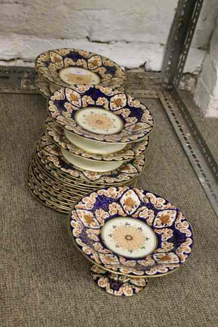 Appraisal: AN ENGLISH PORCELAIN DESSERT SET each piece with cobalt blue