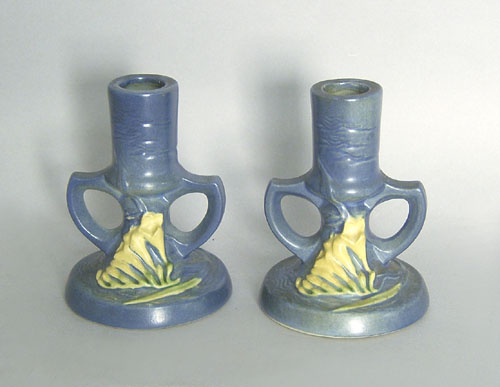 Appraisal: Pair of Roseville candlesticks h