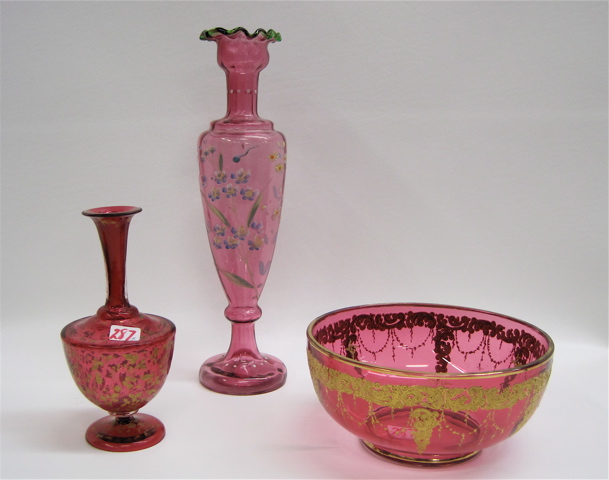 Appraisal: CRANBERRY GLASS BOWL AND TWO VASES pieces The bowl with