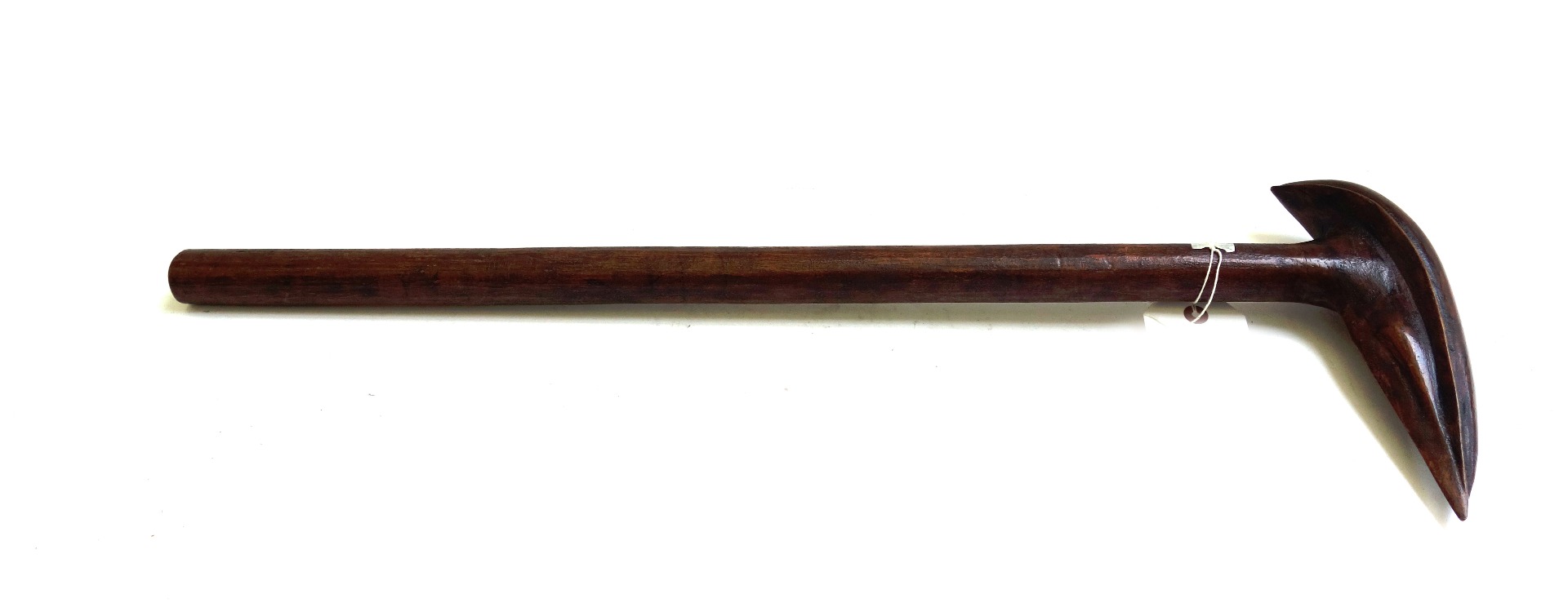 Appraisal: A New Caledonian type wooden club with tapering shaped head