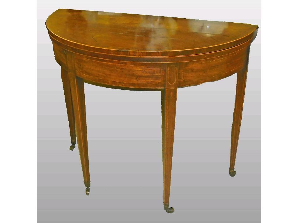 Appraisal: Georgian mahogany demi-lune fold-over tea table the crossbanded top with