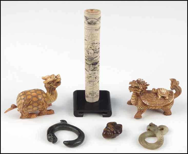 Appraisal: TWO CARVED BONE ANIMALS Together with a bone carving on