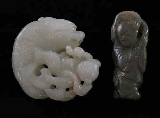 Appraisal: A Chinese pale celadon jade figure of a boy on