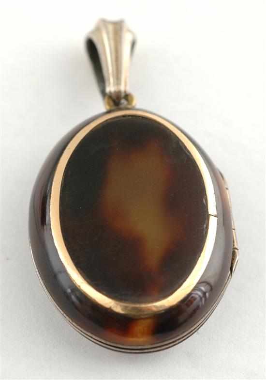 Appraisal: An Antique tortoiseshell locket The hinged oval locket with glazed