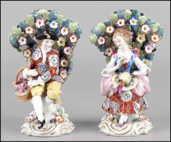 Appraisal: PAIR OF CONTINENTAL PORCELAIN SEATED FIGURES Height '' Condition No