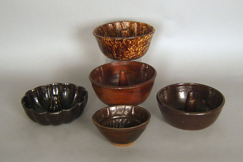 Appraisal: Five earthenware food molds th c