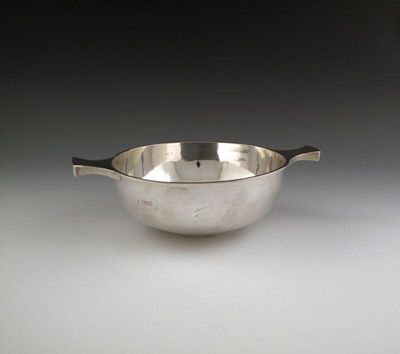 Appraisal: An Edwardian silver quaich by Nathan and Hayes London plain