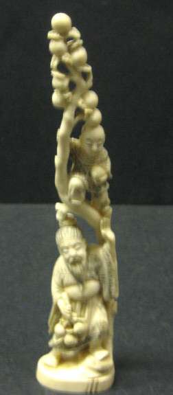 Appraisal: CHINESE IVORY FIGURE GROUP Carved tusk section depicting an elder