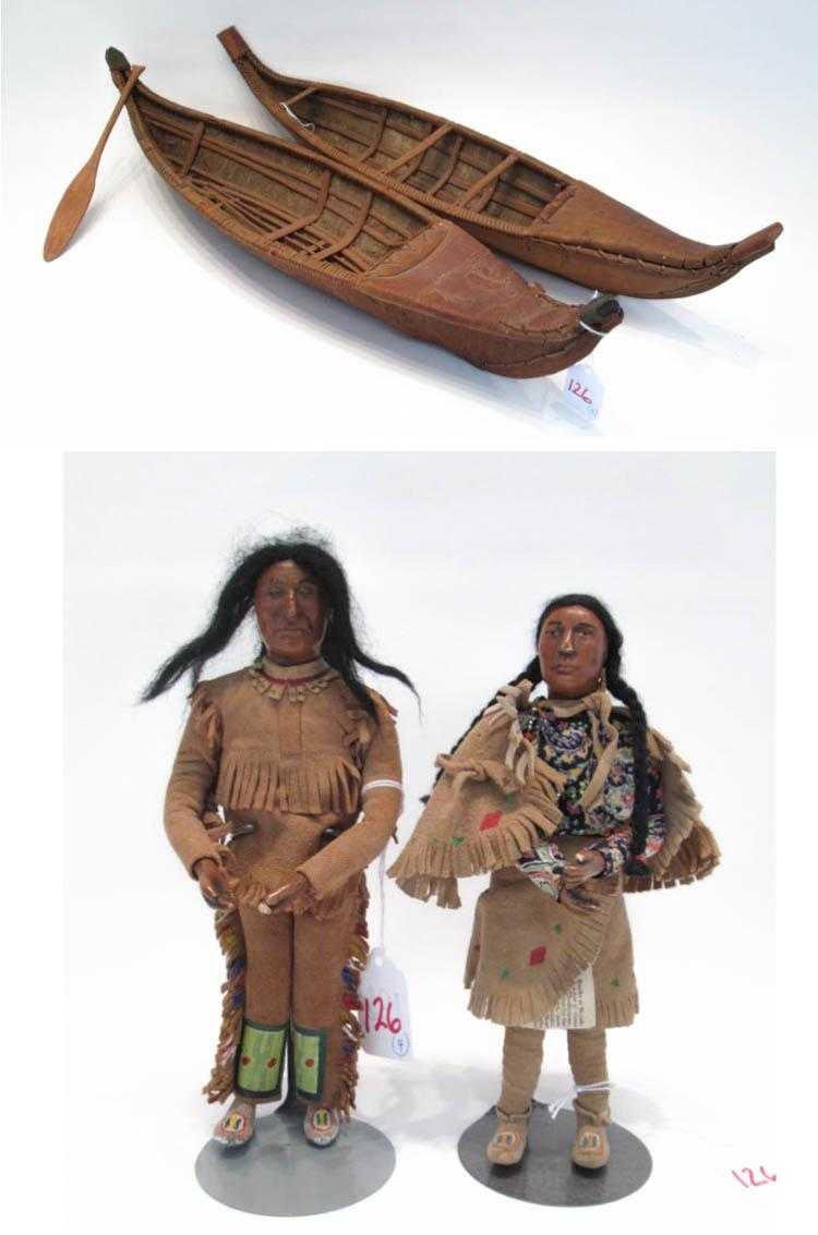 Appraisal: FOUR NATIVE AMERICAN RELATED ITEMS two dolls Sacagawea and Pierre