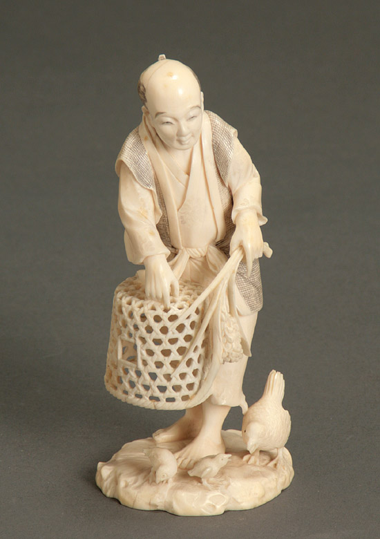 Appraisal: Japanese Ivory Okimono of a Bird Catcher Signed Ryusho Meiji-Taisho