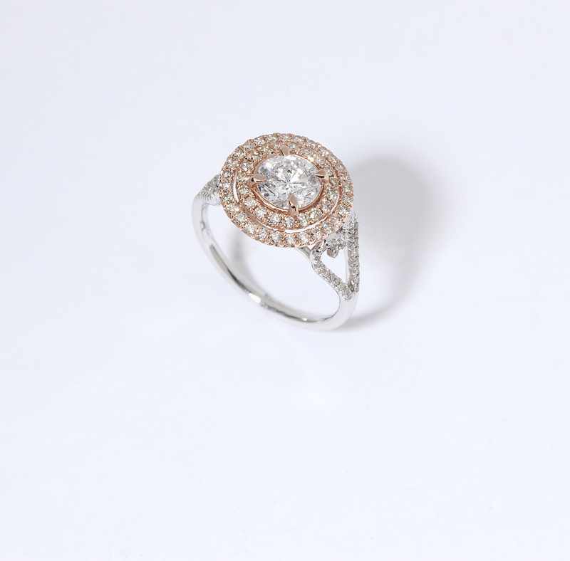 Appraisal: A diamond and bicolor gold ring K rose and white