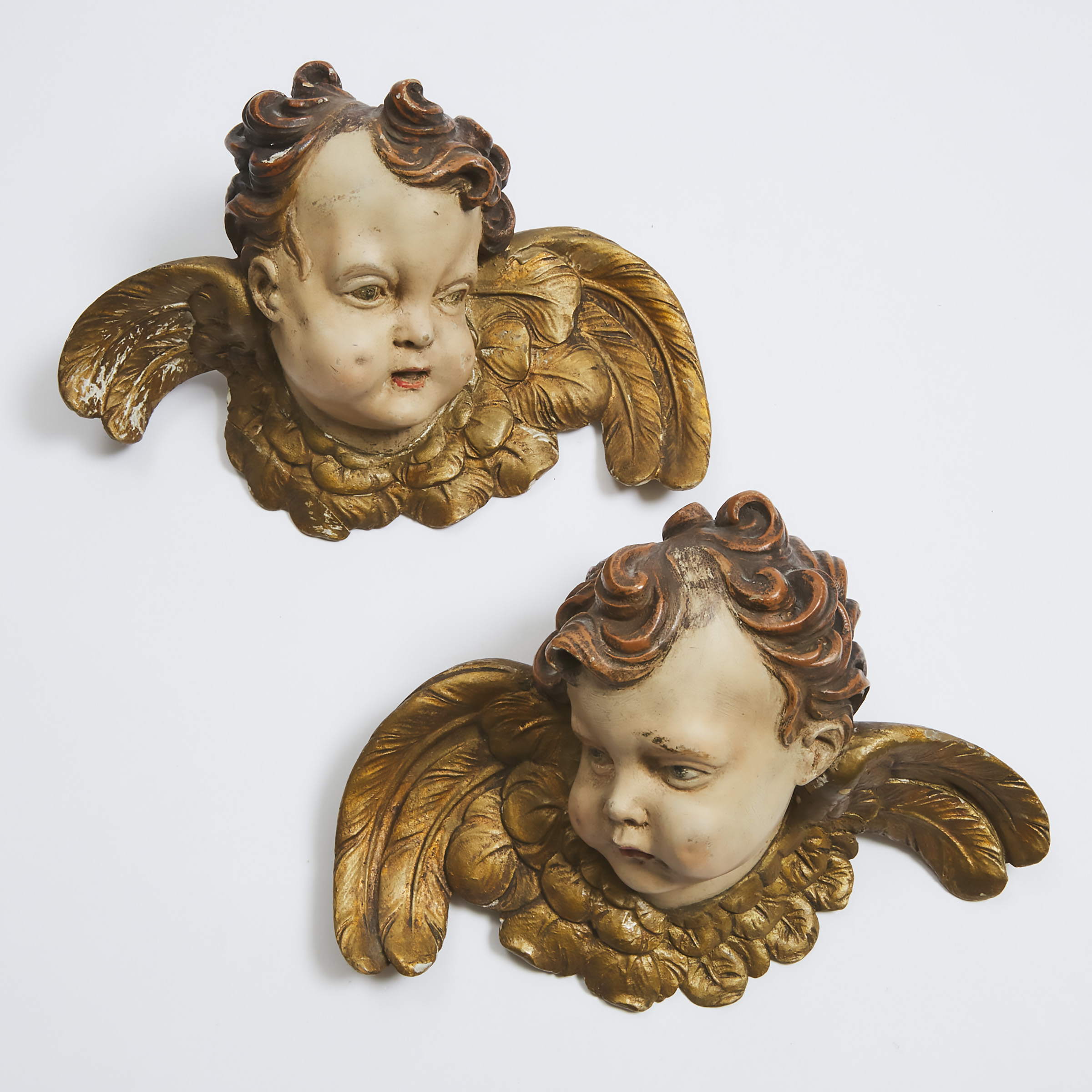 Appraisal: Pair of Italian Baroque Carved Polychromed and Parcel Gilt Winged