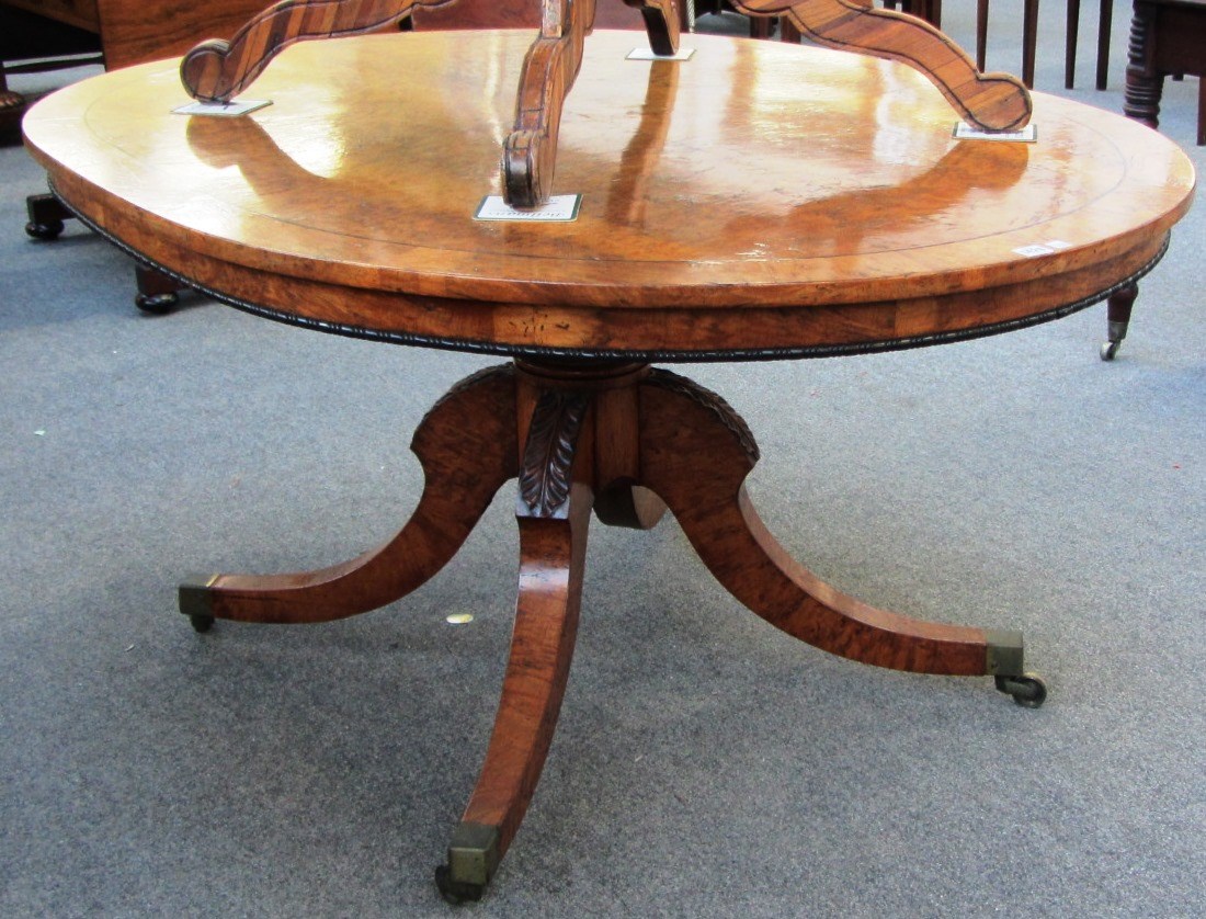 Appraisal: A George III and later oval pollard oak snap top