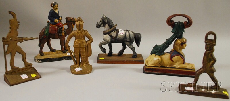 Appraisal: Six Painted Cast Iron and Brass Figural Doorstops an Arab