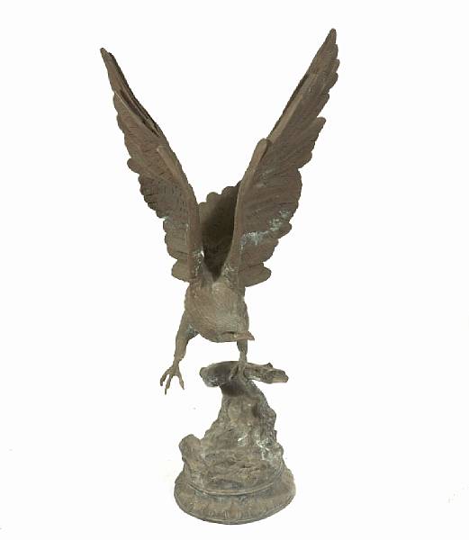 Appraisal: A patinated bronze figure of an eagle height in width