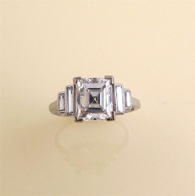 Appraisal: A diamond solitaire ring circa The asscher cut diamond weighs