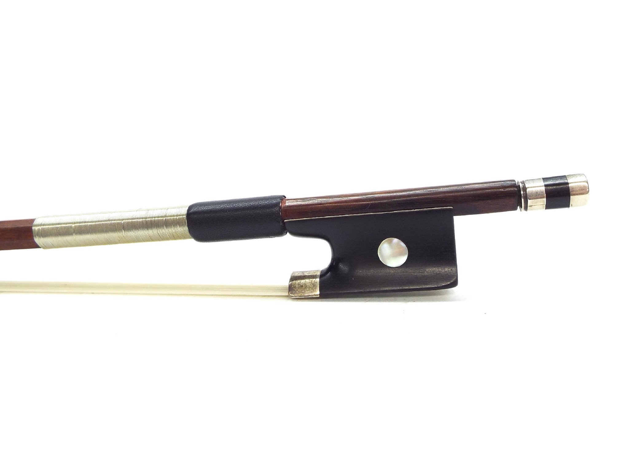 Appraisal: Silver mounted violin bow faintly stamped the stick round the