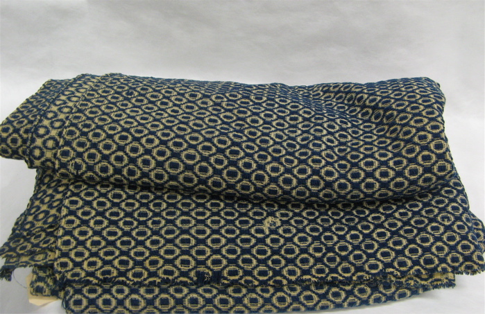 Appraisal: AN AMERICAN TH CENTURY WOOL JACQUARD COVERLET hand loomed blue