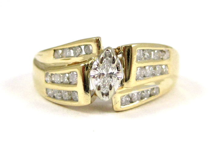 Appraisal: DIAMOND AND TEN KARAT GOLD RING with twelve round-cut diamonds