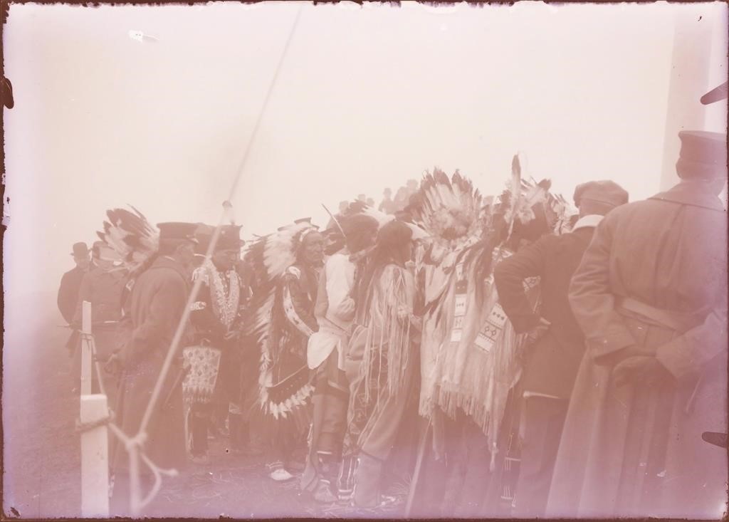 Appraisal: Circa glass negative of a group of Indians with headdresses