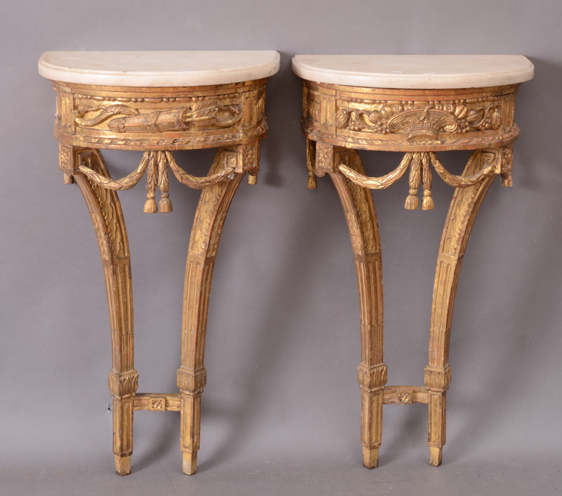 Appraisal: PAIR OF SMALL LOUIS XVI CARVED GILTWOOD CONSOLE TABLES Each