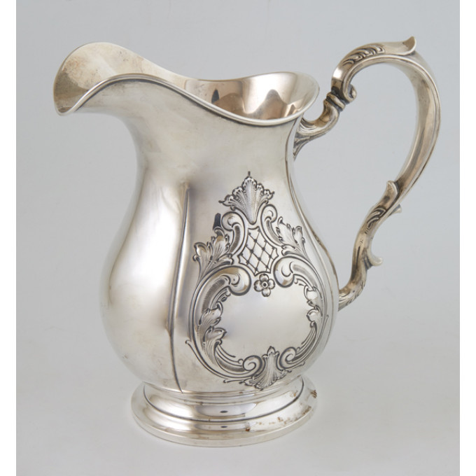 Appraisal: Fisher Sterling Pitcher Hand Chased the sides with repousse scroll