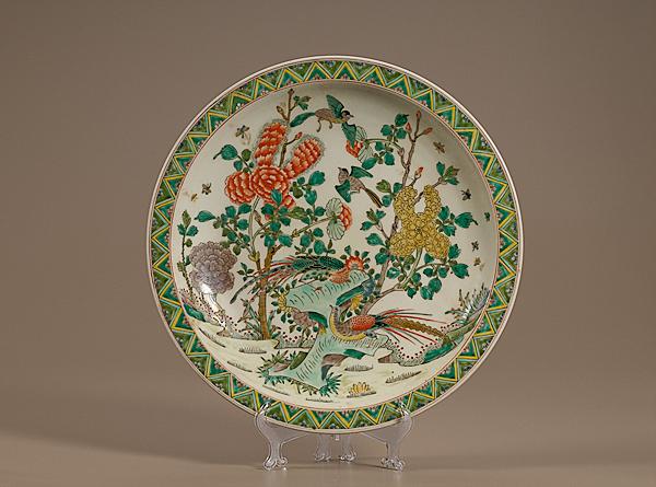 Appraisal: FAMILLE VERTE CHARGER WITH EXOTIC BIRDS Chinese export porcelain charger