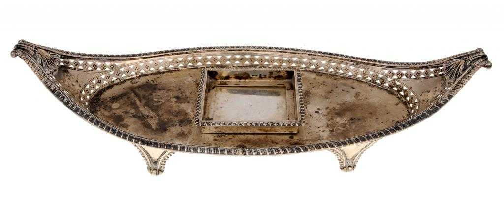 Appraisal: A VICTORIAN NAVETTE SHAPED INKSTAND the gadrooned tray with pierced