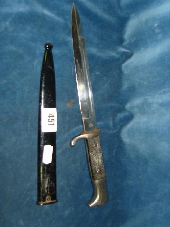 Appraisal: A German WWI short knife bayonet with steel scabbard