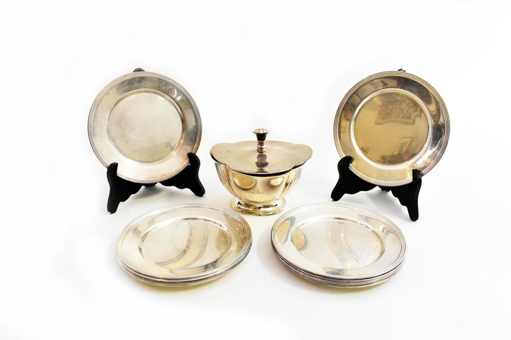 Appraisal: EIGHT SILVER PLATE BREAD PLATES COVERED SUGAR BOWLThe circular plates