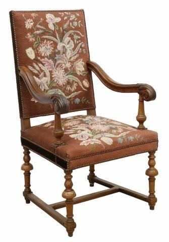 Appraisal: French Henri II style walnut highback armchair th c padded