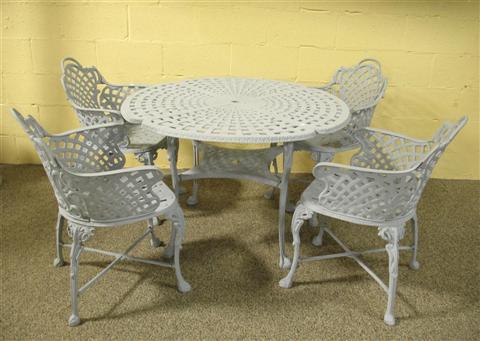 Appraisal: FIVE PIECE CAST ALUMINUM PATIO SET Including table and four